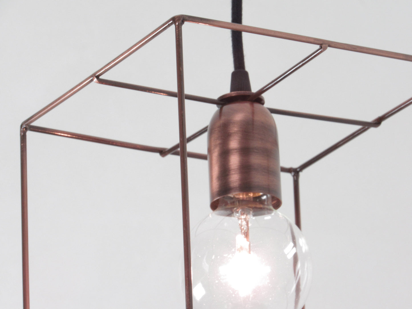 Handmade antique copper wire cube cage pendant light with Edison bulb, Athens Lightworks - Detail