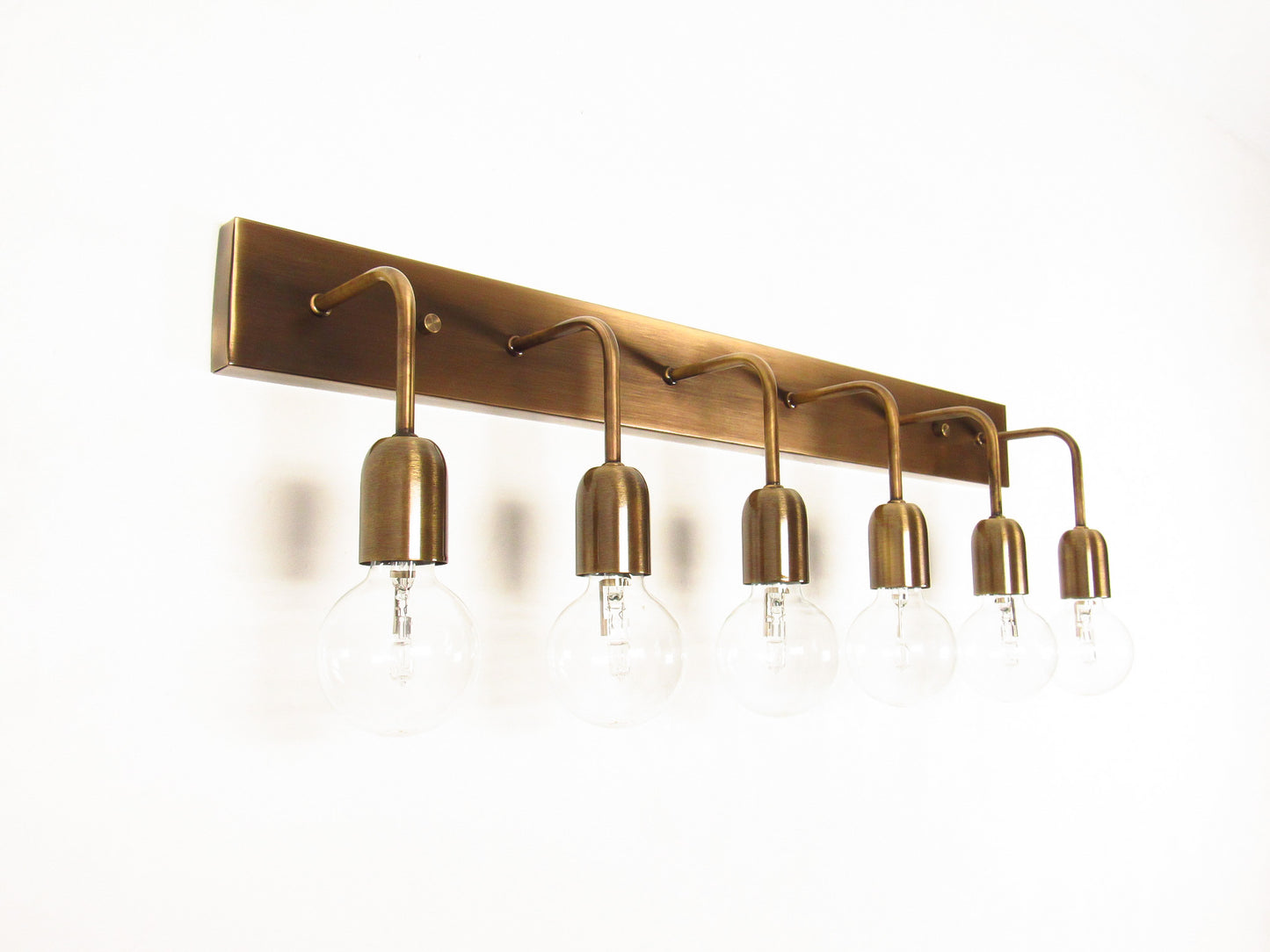 Linear Vanity Light — Minimal Bracket Cluster