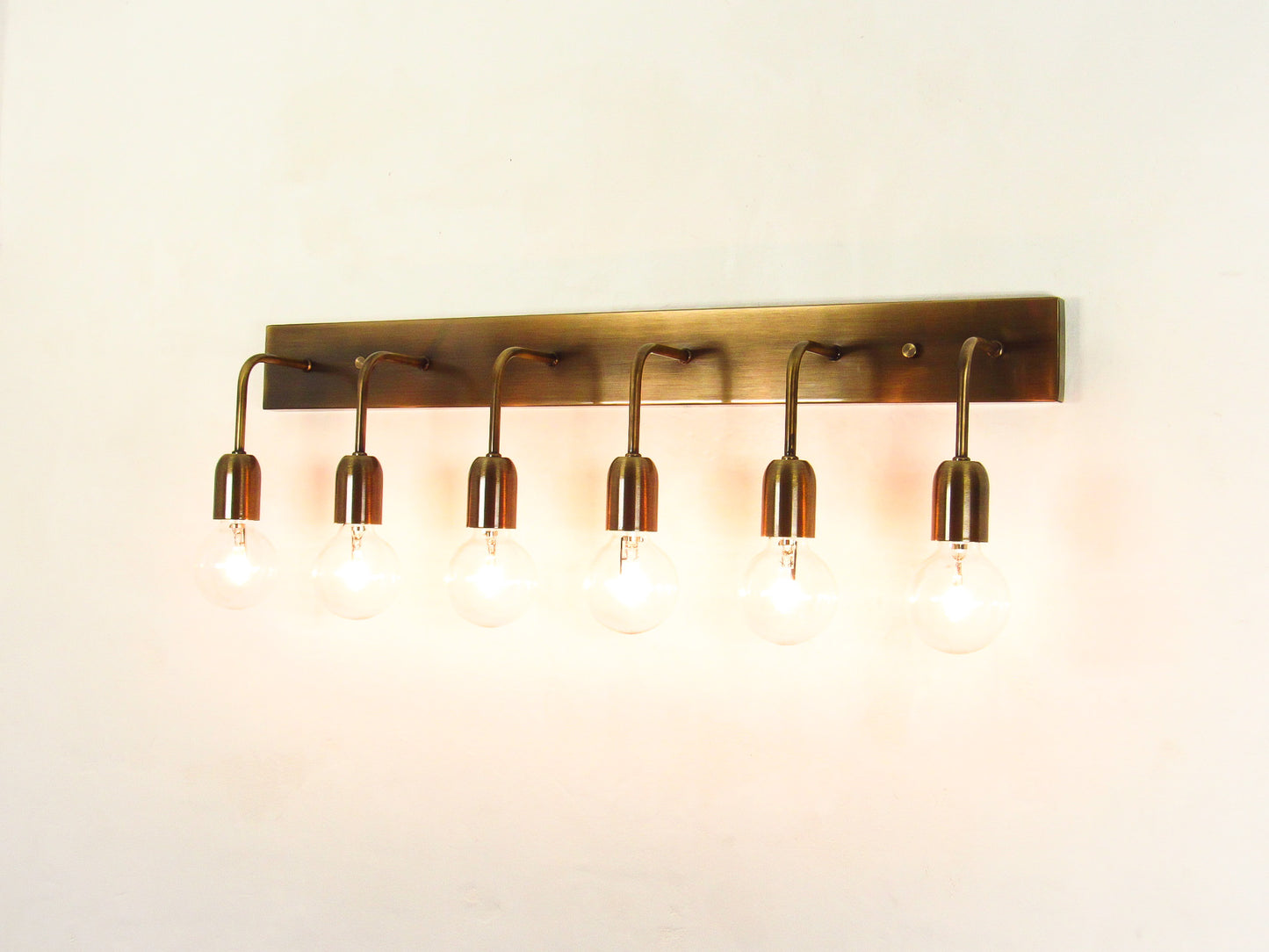 Linear Vanity Light — Minimal Bracket Cluster