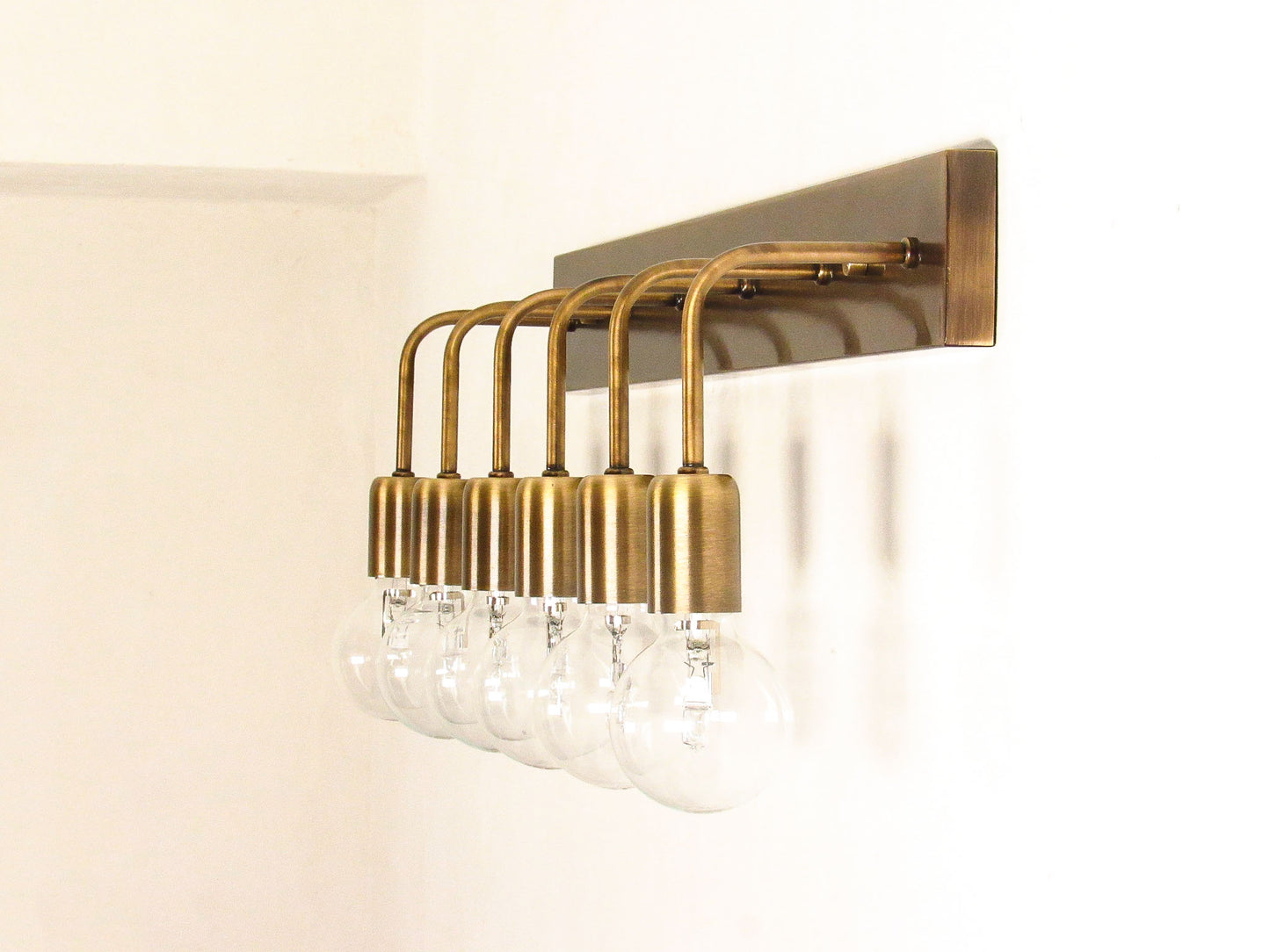 Linear Vanity Light — Minimal Bracket Cluster