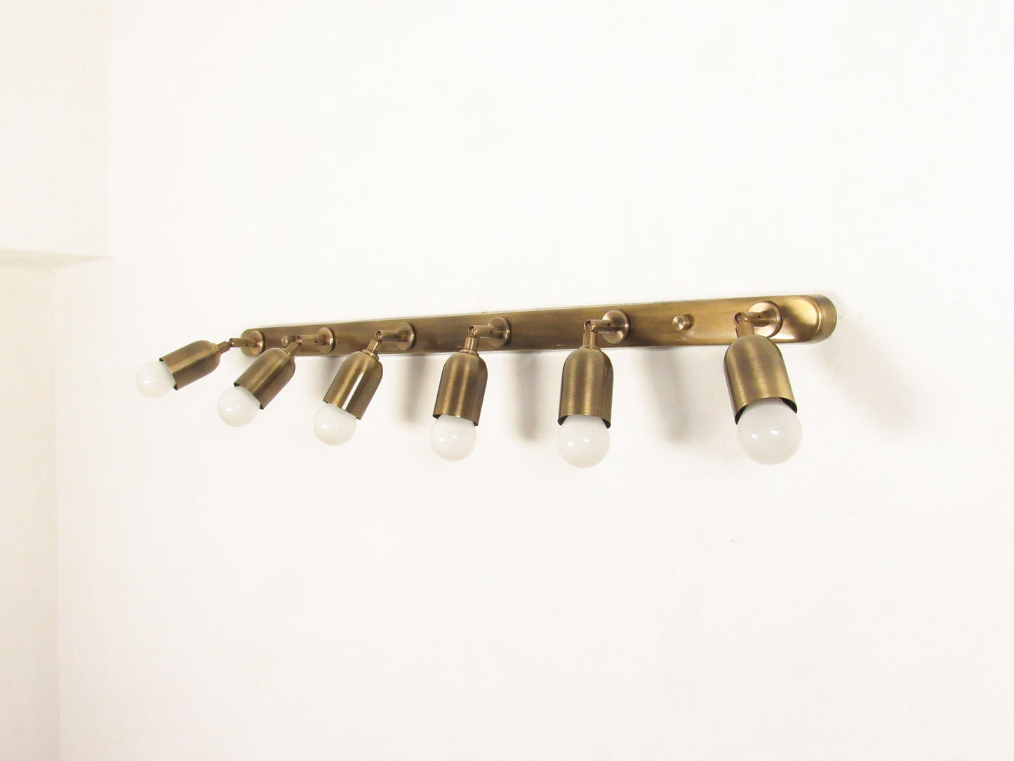 Linear Adjustable Wall Sconce — Minimal Vanity Light