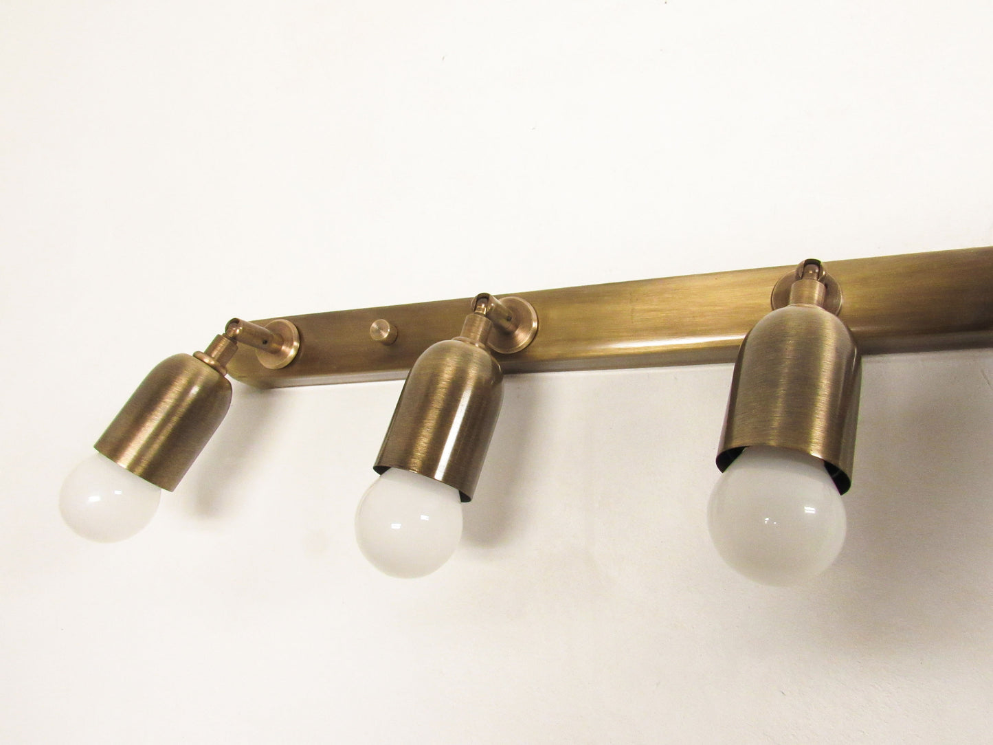 Linear Adjustable Wall Sconce — Minimal Vanity Light